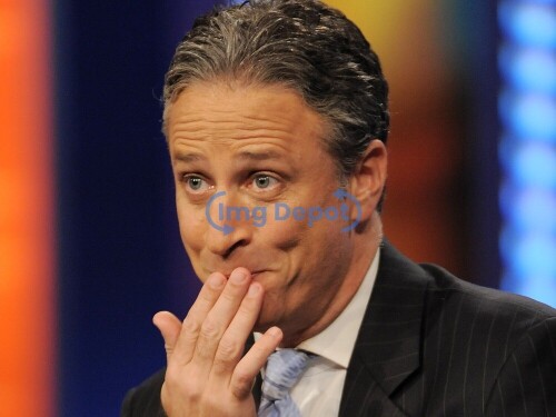 ** FILE ** In this Oct. 8, 2008 file photo, host Jon Stewart gestures during a taping of "The Daily Show with Jon Stewart"  in New York. (AP Photo/Evan Agostini, file)